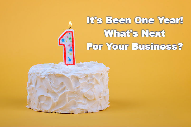 cake with 1st birthday candle on top