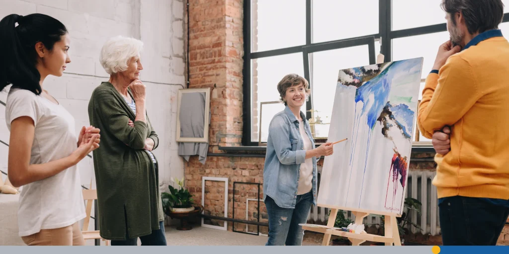 Female Artist Presenting Painting