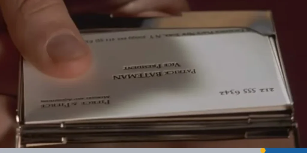 Person taking a business card out of a holder