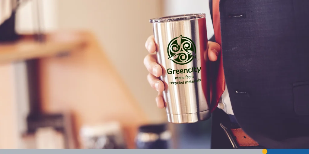 Selective focus shot of a man in tuxedo holding a thermos mug