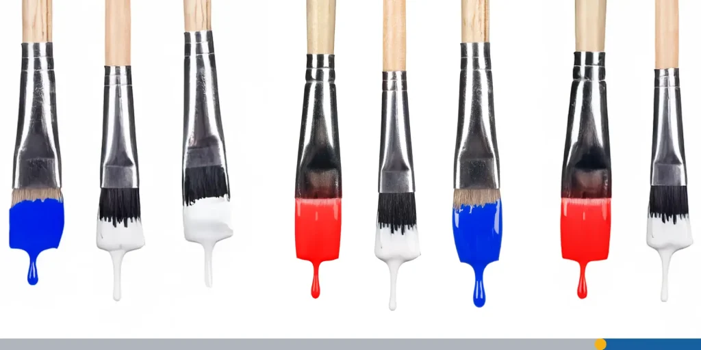 Dripping paint brushes.