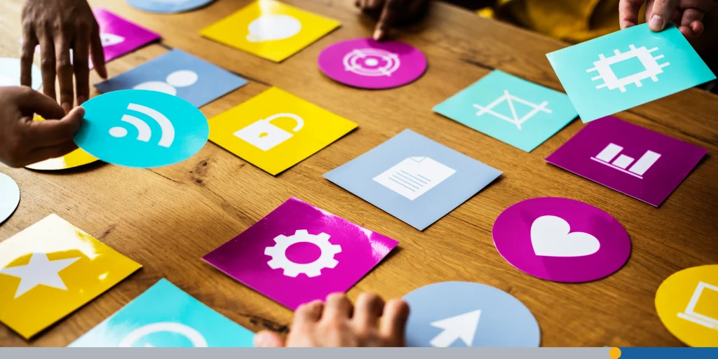Group of computer icon on the wooden table