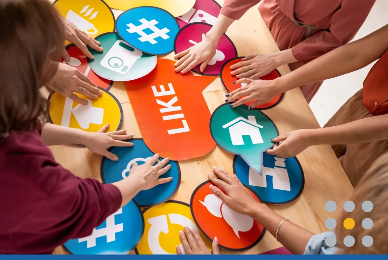 Hands of several friendly millennials choosing paper speech bubbles with icons