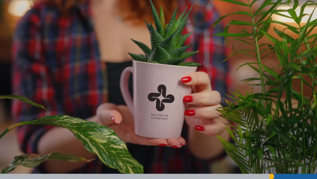 Coffee mug with a plant in it