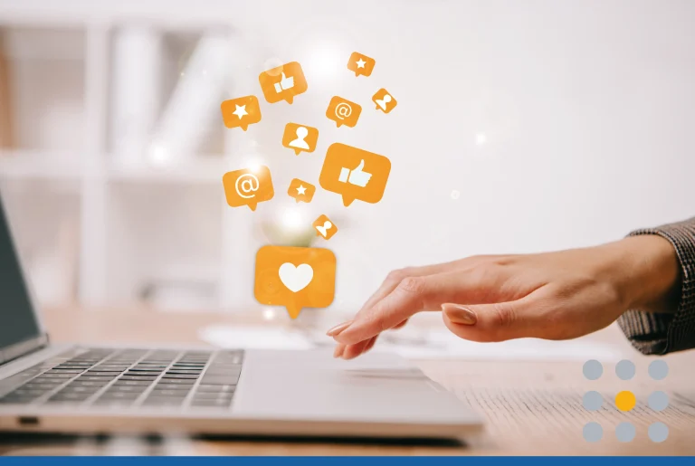 Woman working on a laptop exploring tips for social media marketing for small business