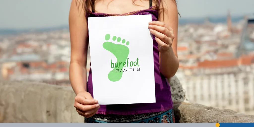 Woman holding paper green foot