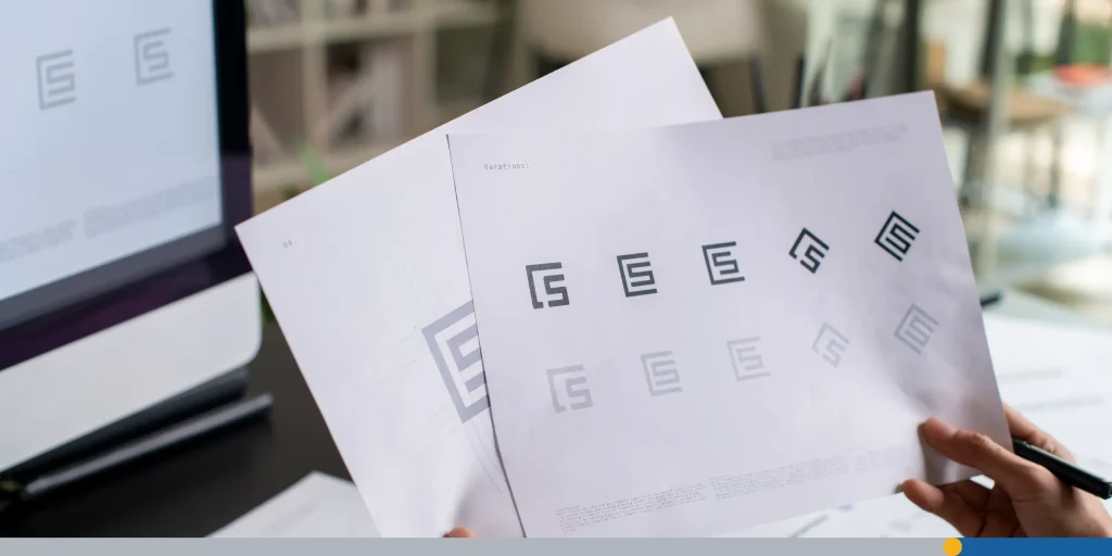 Graphic designer drawing sketches logo design. Stock Photo, ft. brand guidelines & logo design - Envato