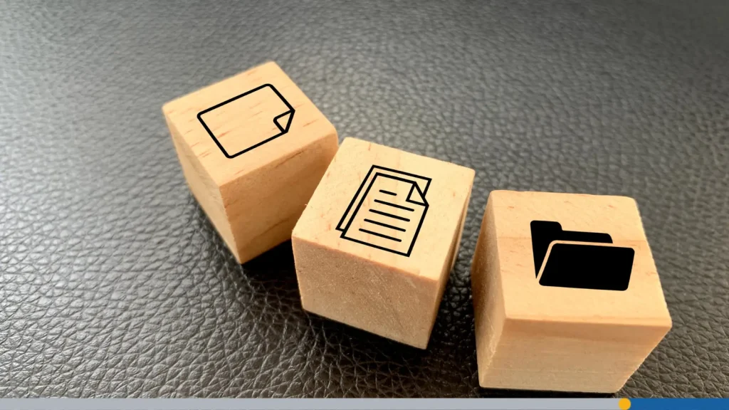 Computer icons on wooden blocks