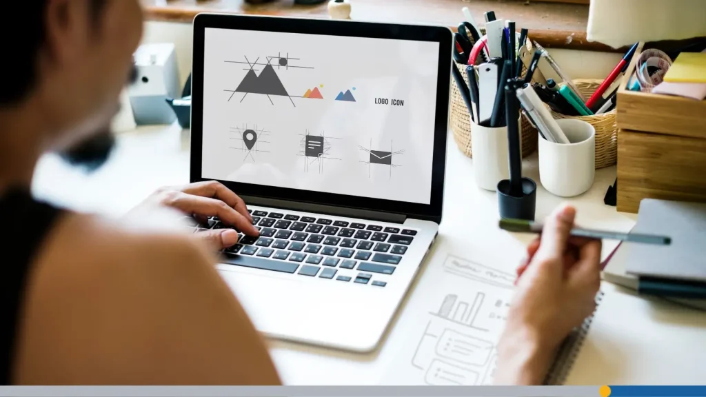 Person designing a logo on a computer