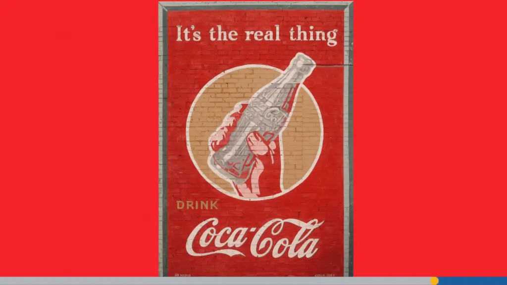 1940s Coca‑Cola advertisement painted on a brick wall in Minden, Louisiana, showing a vintage Coca‑Cola logo mural.