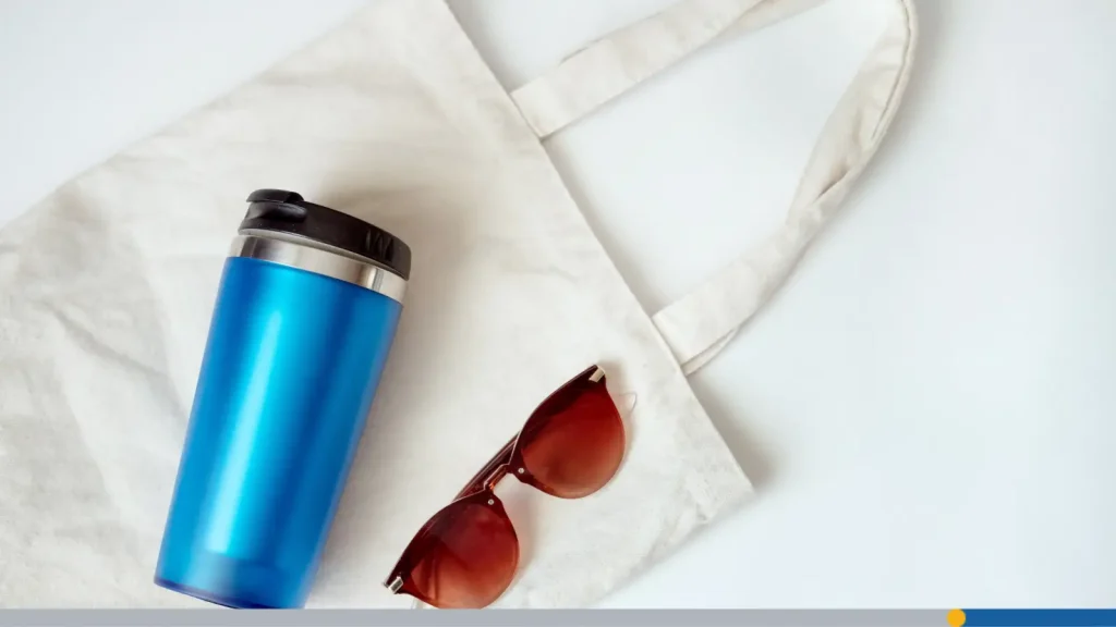 Travel cup with a tote bag and glasses