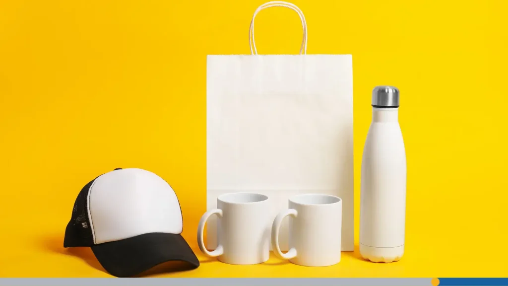 Promotional items including mugs, water bottles, and hats