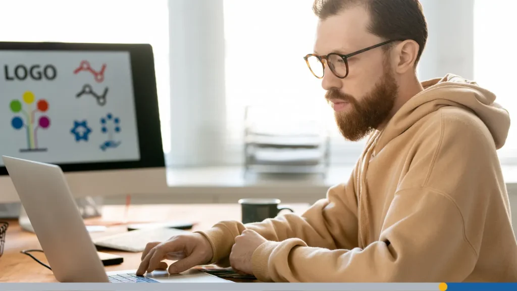 Person designing a logo on a computer