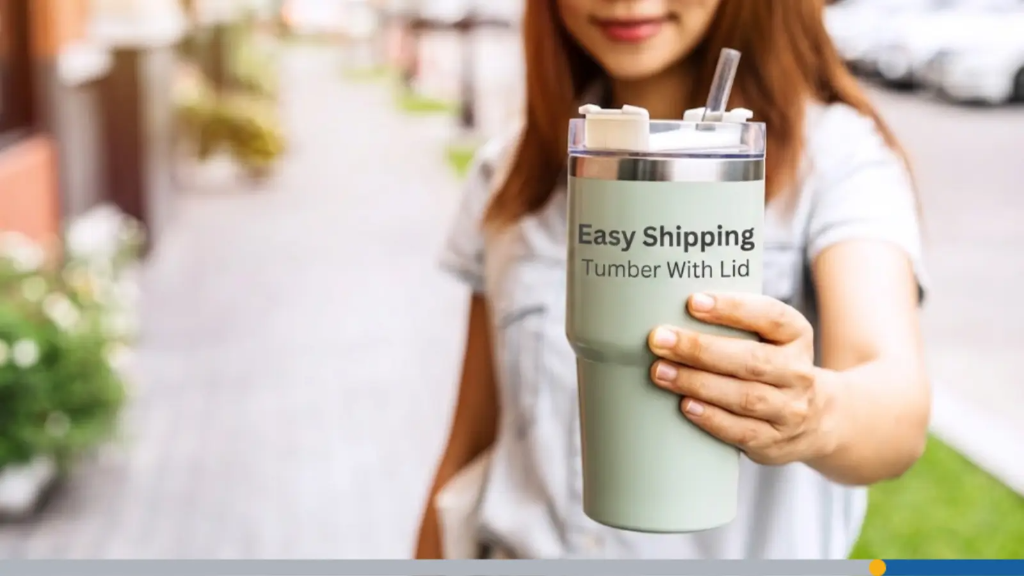 A young woman holds out a drinking tumbler with a lid, featuring the words easy shipping, tumbler with lid, showcasing branded office supplies.