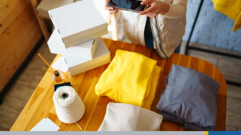 Person organizing T-shirt inventory