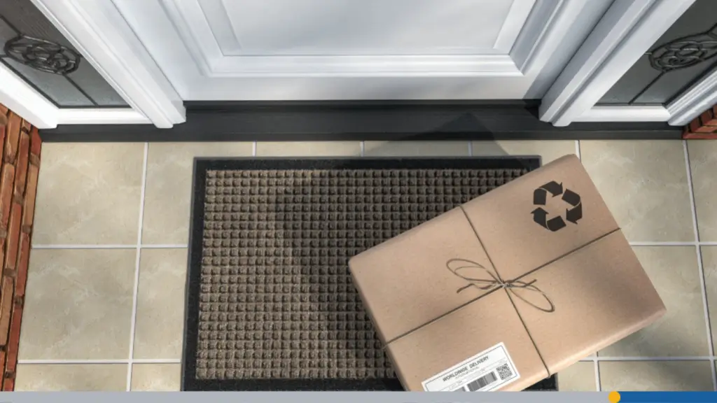 A package containing customized business cards has been delivered and left at someone’s front door.