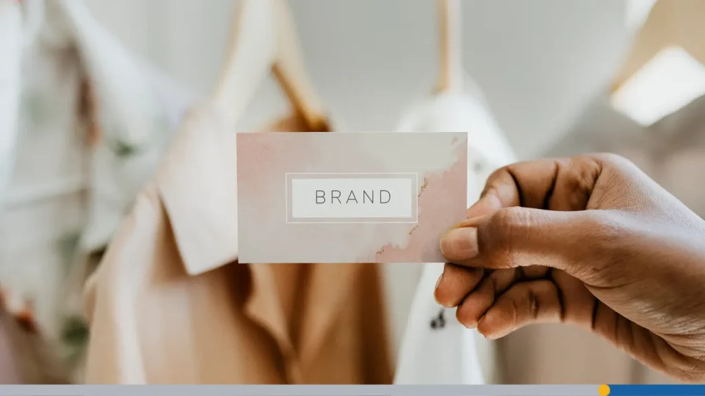 Person holding up a brand note