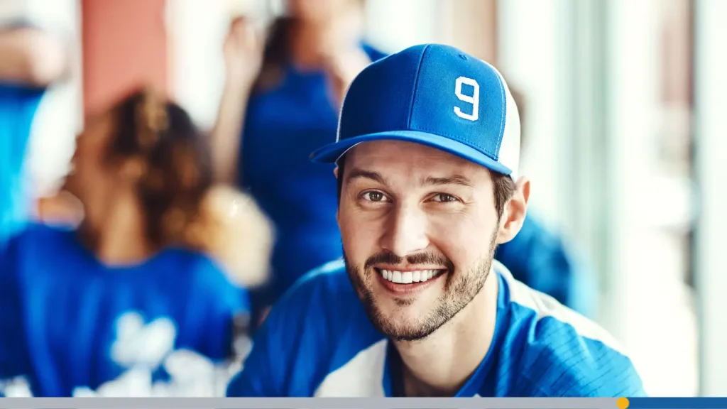Baseball player wearing a blue cap