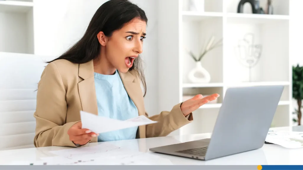 Woman angry at her laptop
