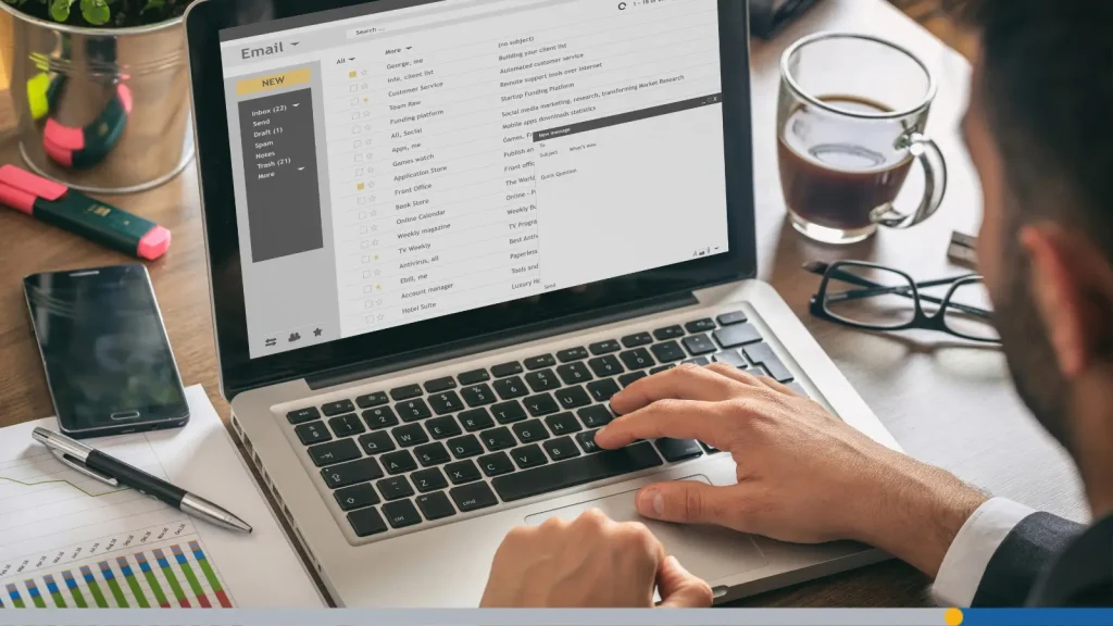 Businessman opening up his emails