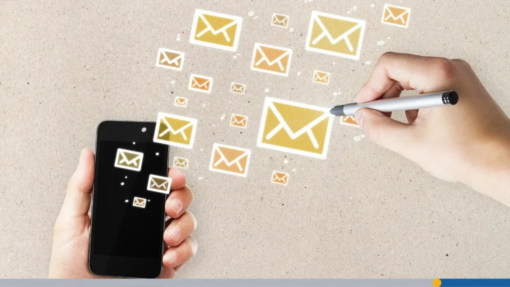 Digital emails coming out of a phone