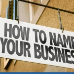 A street sign that reads HOW TO NAME A BUSINESS.