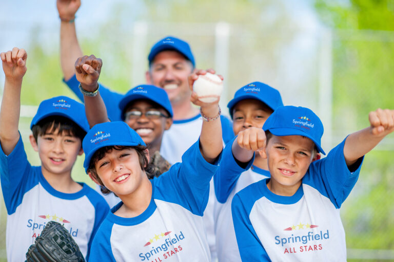 Little League kids in custom t-shirts and hats