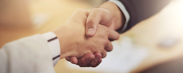 two men shaking hands